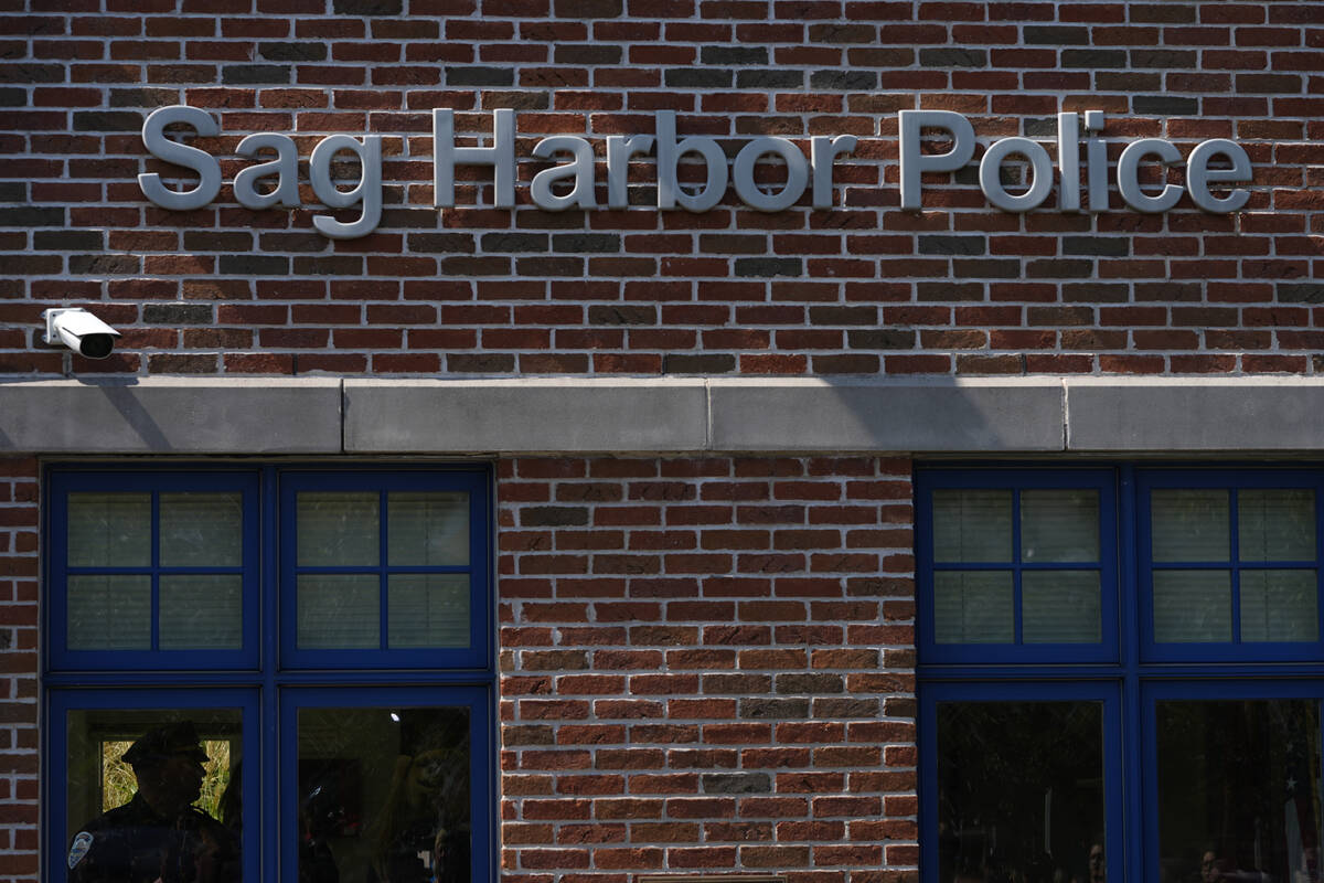 A police officer stands inside the Sag Harbor Police station during Justin Timberlake's hearing ...