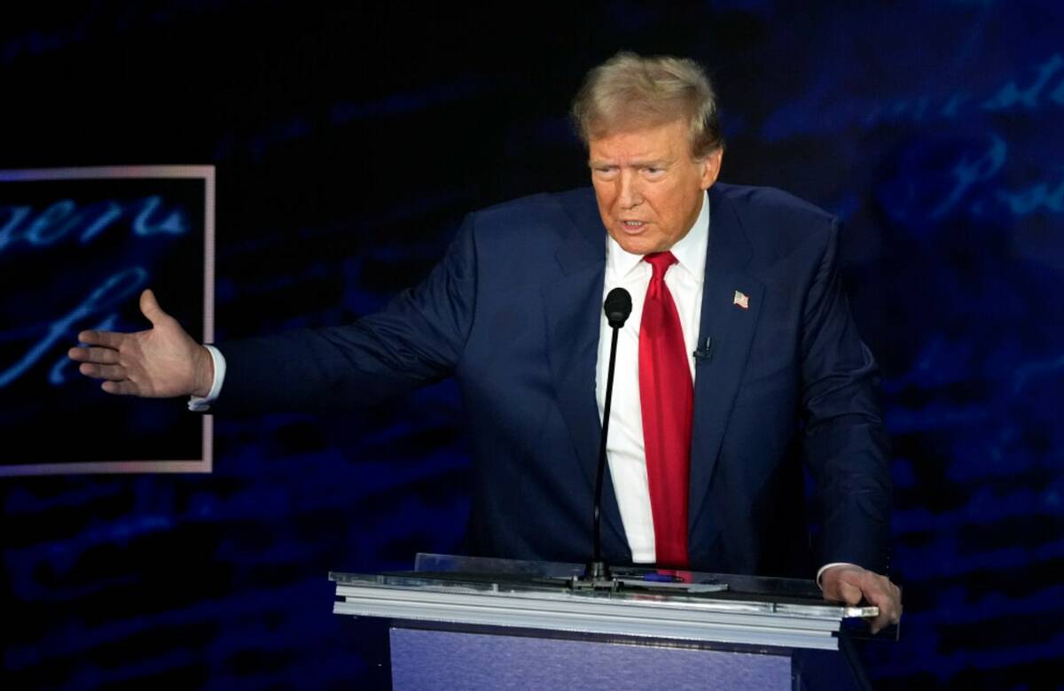 Former President Donald Trump speaks during a presidential debate with Democratic presidential ...