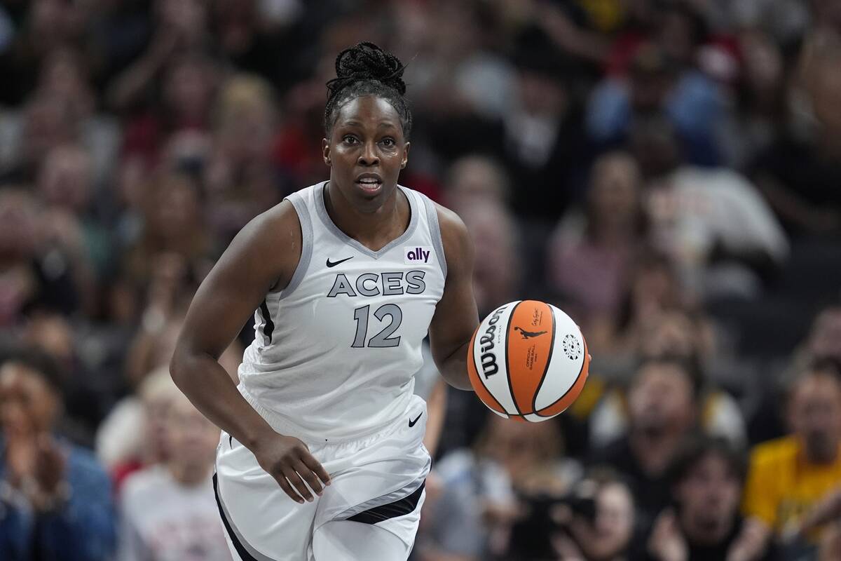 Las Vegas Aces' Chelsea Gray dribbles during the second half of a WNBA basketball game against ...