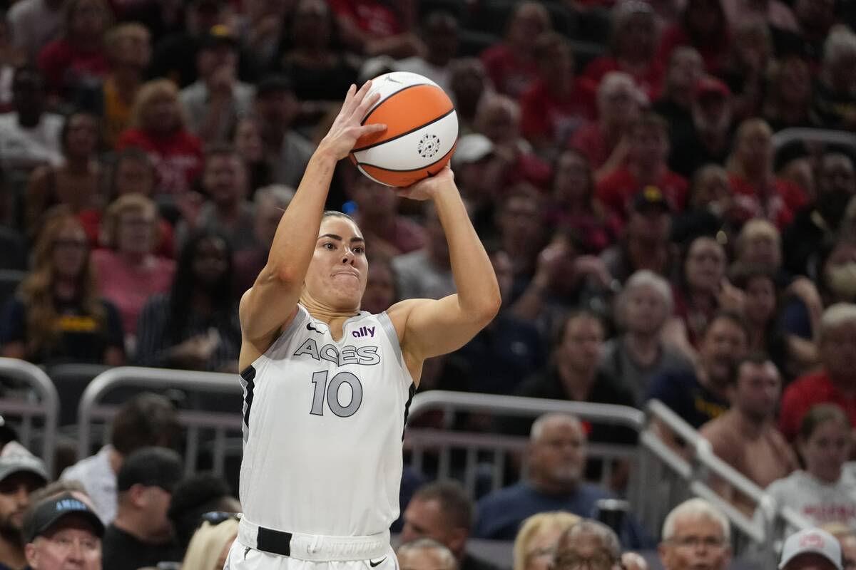 Las Vegas Aces' Kelsey Plum shoots during the second half of a WNBA basketball game against the ...