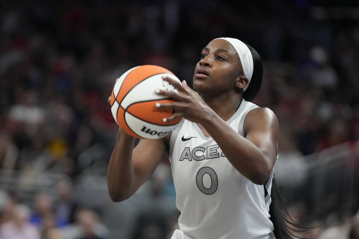 Las Vegas Aces' Jackie Young shoots during the second half of a WNBA basketball game against th ...