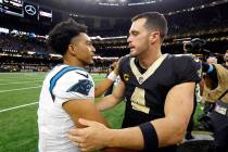 New Orleans Saints quarterback Derek Carr (4) and Carolina Panthers quarterback Bryce Young (9) ...