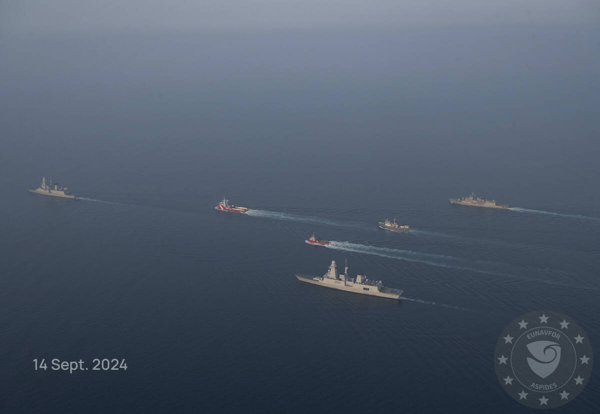 This photo released by the European Union’s Operation Aspides shows warships attached to ...