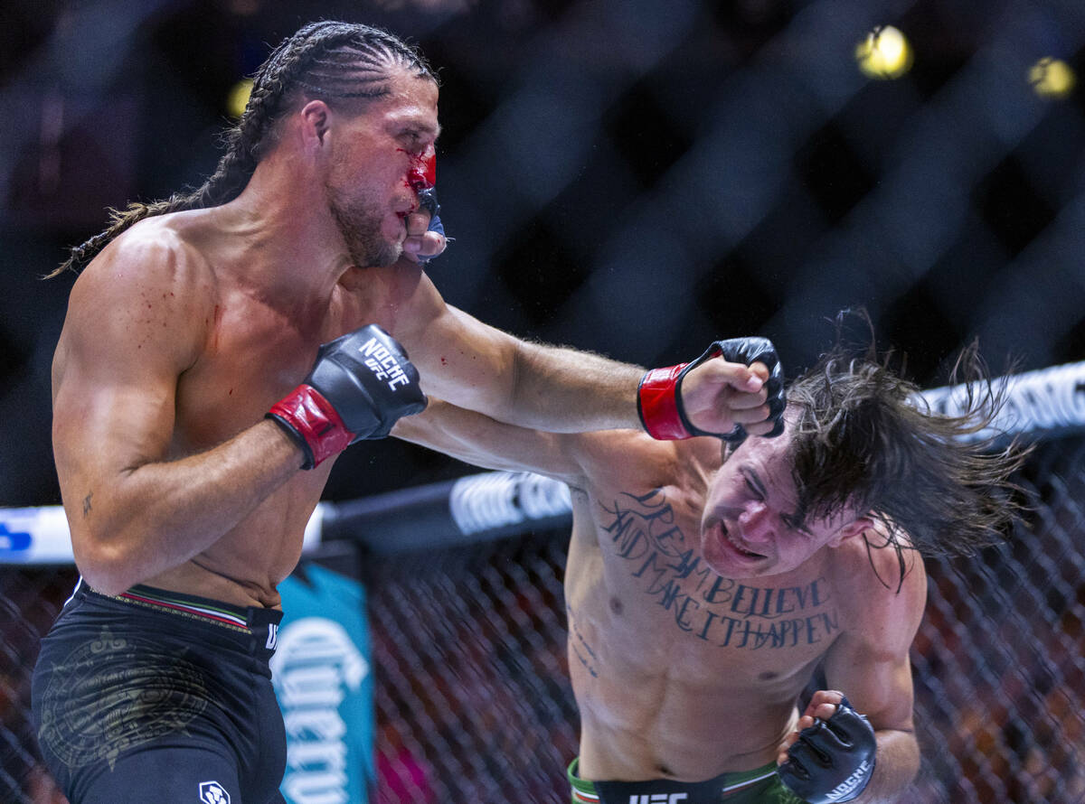 Featherweight Brian Ortega and Diego Lopes trade blows in their fight during UFC 306: Riyadh Se ...