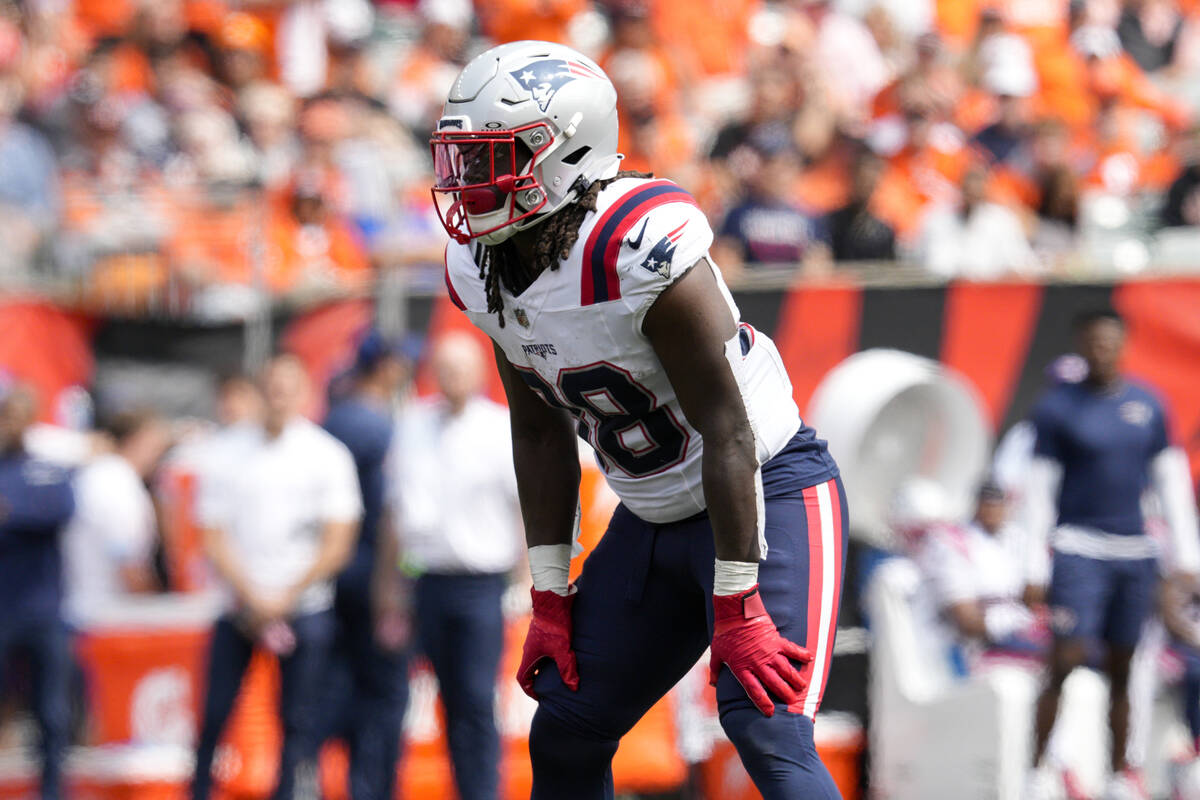 New England Patriots running back Rhamondre Stevenson (38) plays during an NFL football game ag ...