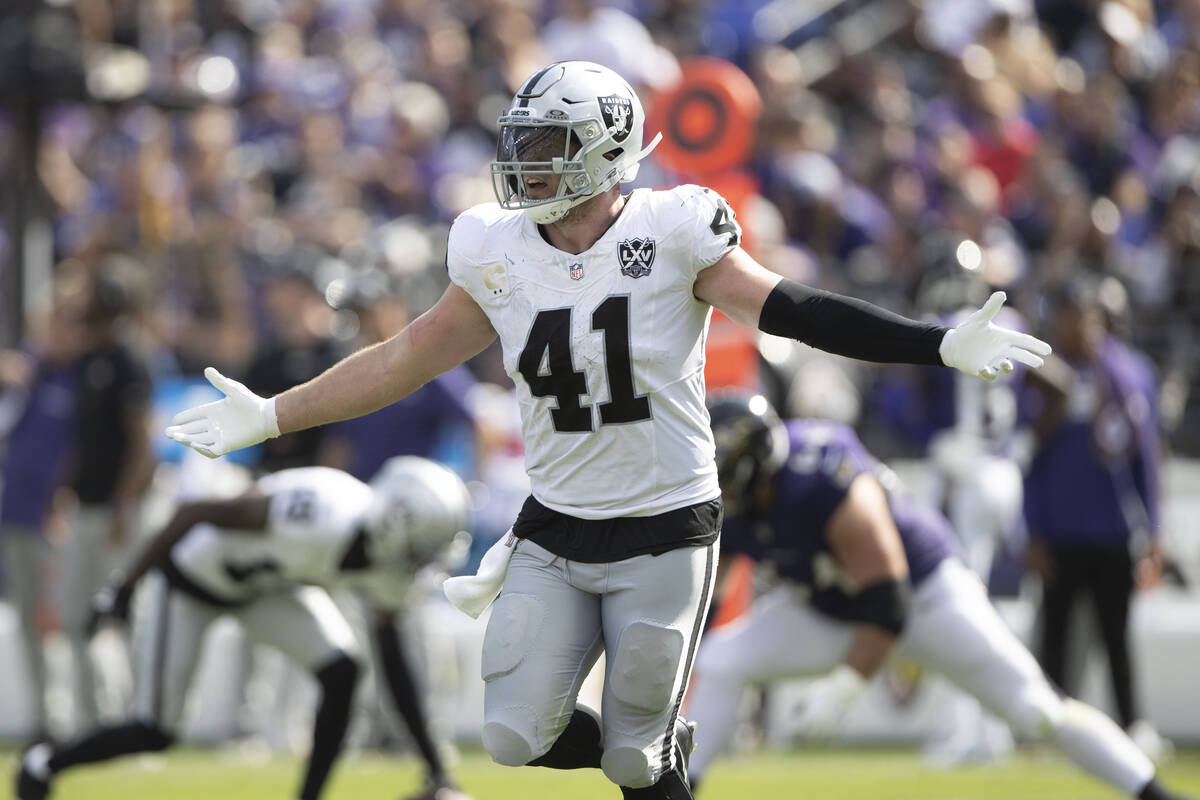 Raiders linebacker Robert Spillane (41) celebrates his interception during the second half of a ...