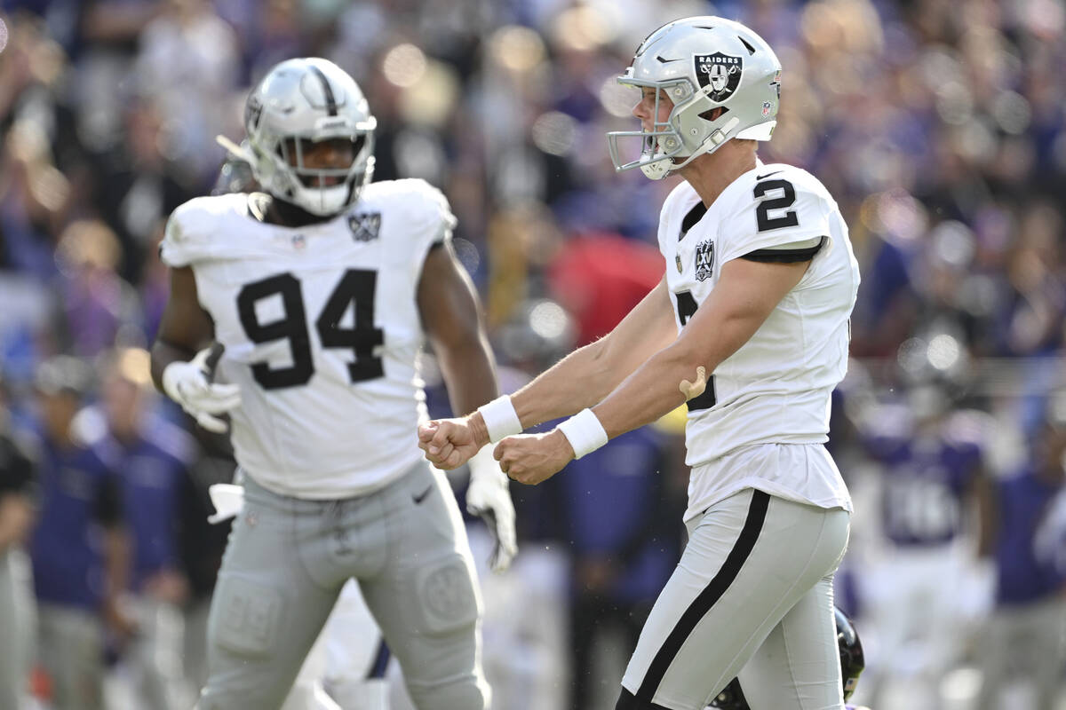 Las Vegas Raiders place kicker Daniel Carlson (2) celebrates kicking the game winning field goa ...