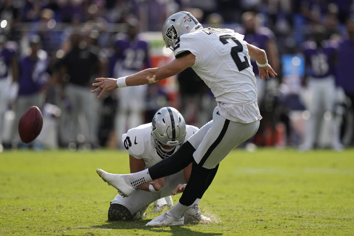 Las Vegas Raiders place kicker Daniel Carlson (2) kicks a field goal against the Baltimore Rave ...