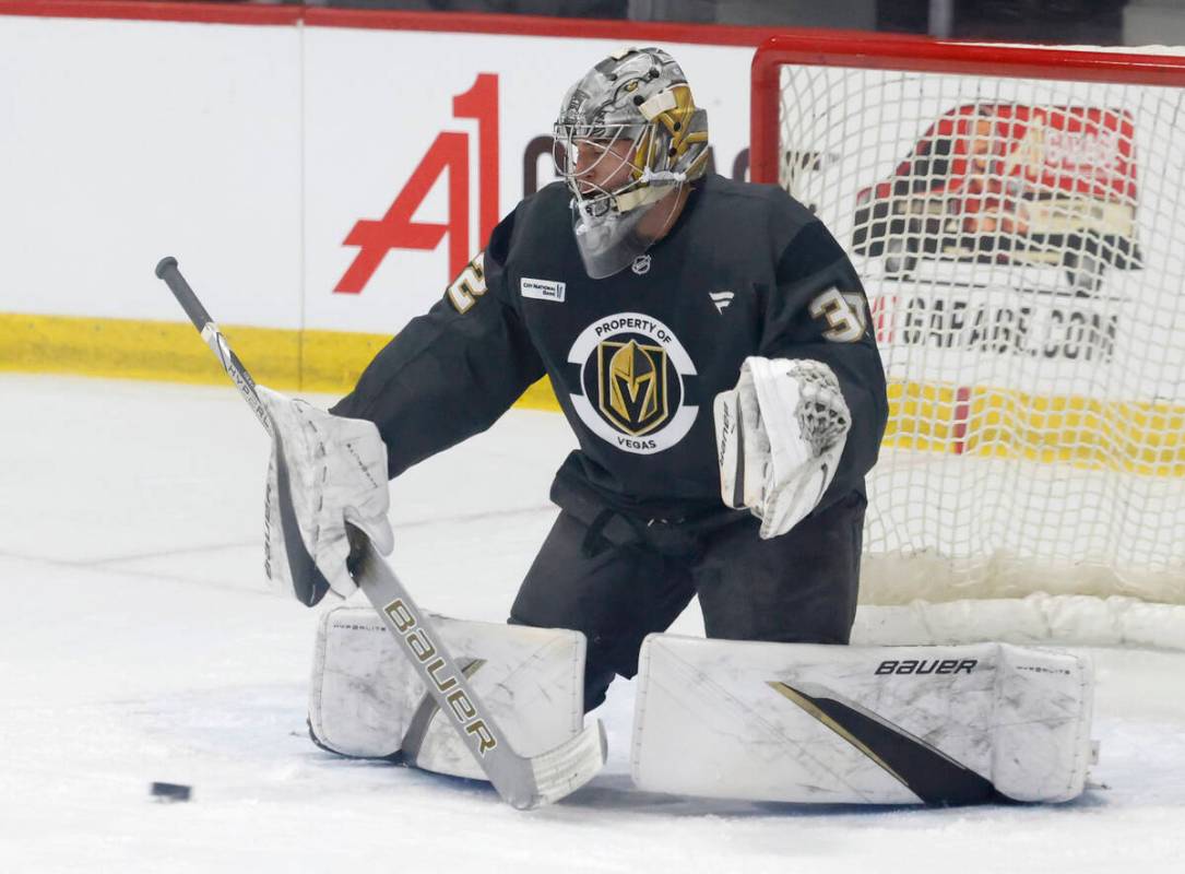 Golden Knights goalie Jesper Vikman (32) blocks a shot during first day of Golden Knights rooki ...