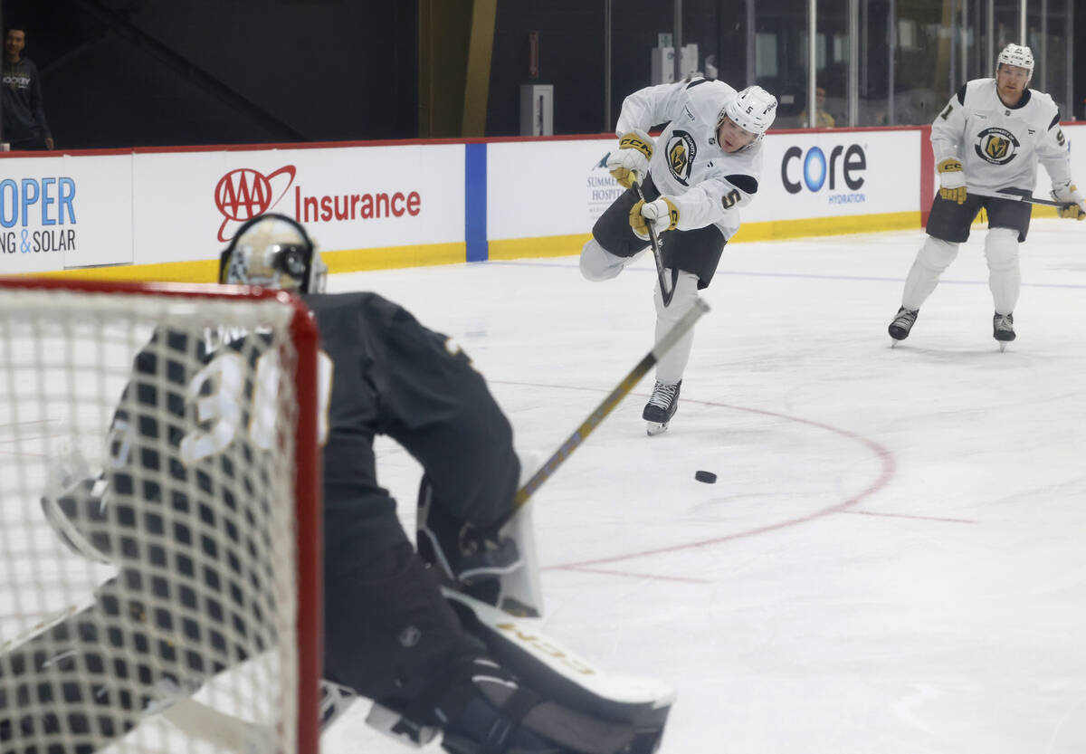 Golden Knights defenseman Daniil Chayka (5) shoots against goalie Carl Lindbom (30) during firs ...