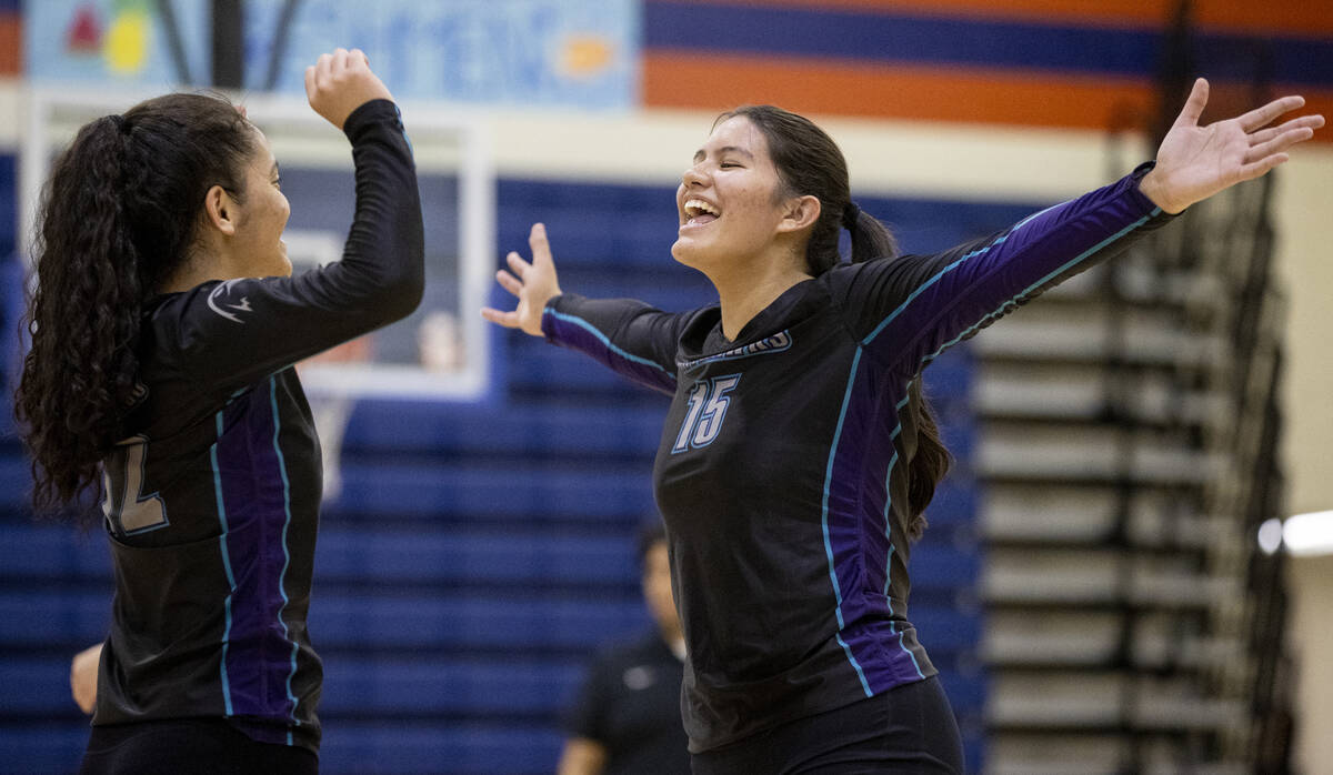 Silverado junior Kalia Roberts (15) celebrates with Silverado senior Suriah Roberts (12) during ...