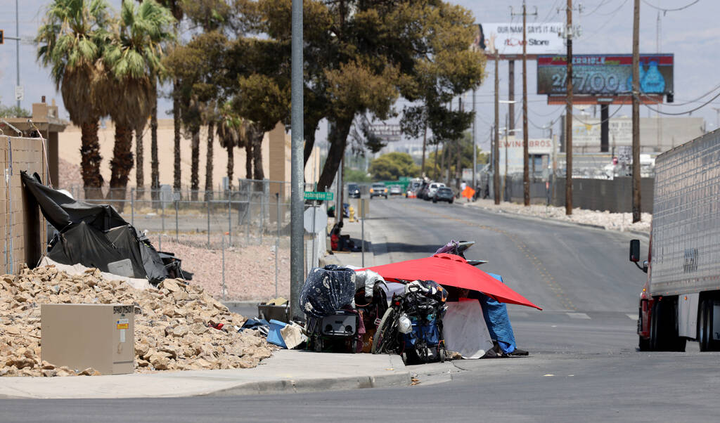 Tents are seen on A Street near Washington Avenue in Las Vegas Friday, July 26, 2024. (K.M. Can ...