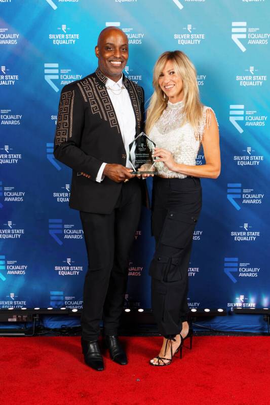 Silver State Equality State Director André C. Wade and pop star Debbie Gibson are shown at the ...