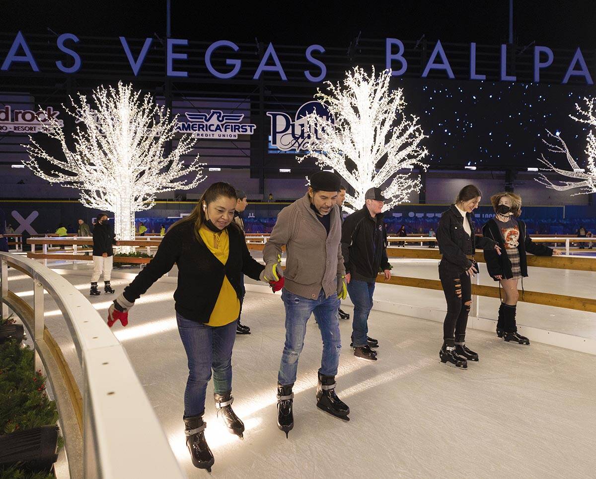 Ice skaters enjoy Enchant Christmas at Las Vegas Ballpark on Tuesday, Nov. 30, 2021, in Las Veg ...