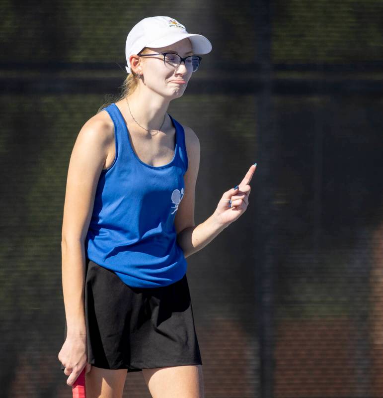 Basic’s Gail Peters frowns and puts her finger up after serving the ball out of bounds d ...