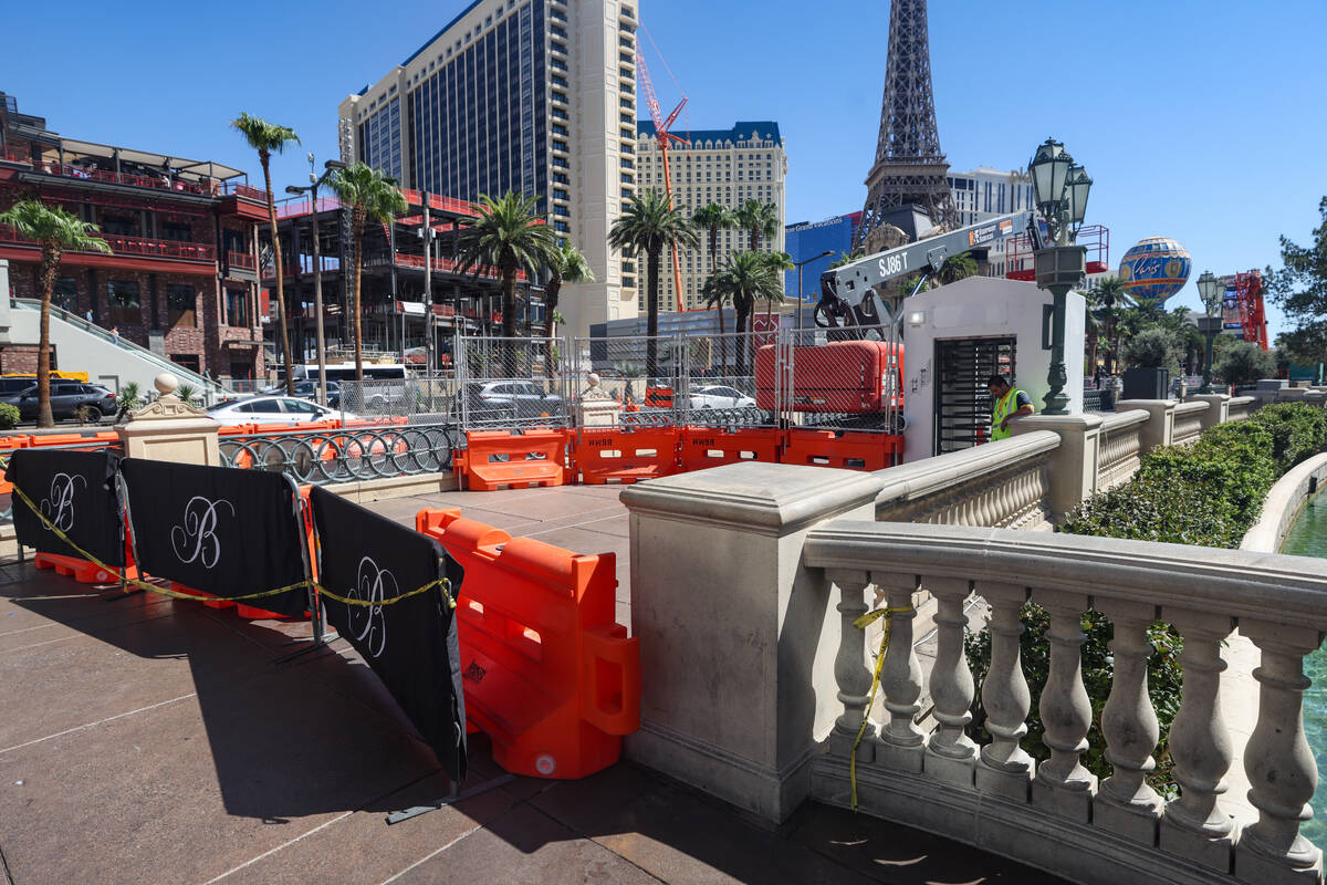 Tractors and equipment near the trees outside the Bellagio hotel-casino in Las Vegas, Tuesday, ...