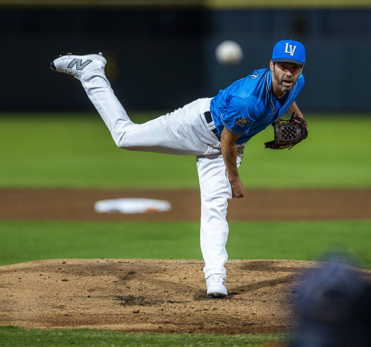 Aviators pitcher Austin Pruitt (25) fires the ball to the plate and an El Paso Chihuahuas batte ...