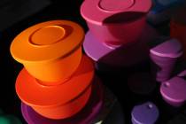 Colorful Tupperware products are seen in Bellflower, Calif. on Aug. 5, 2011. (AP Photo/Garrett ...