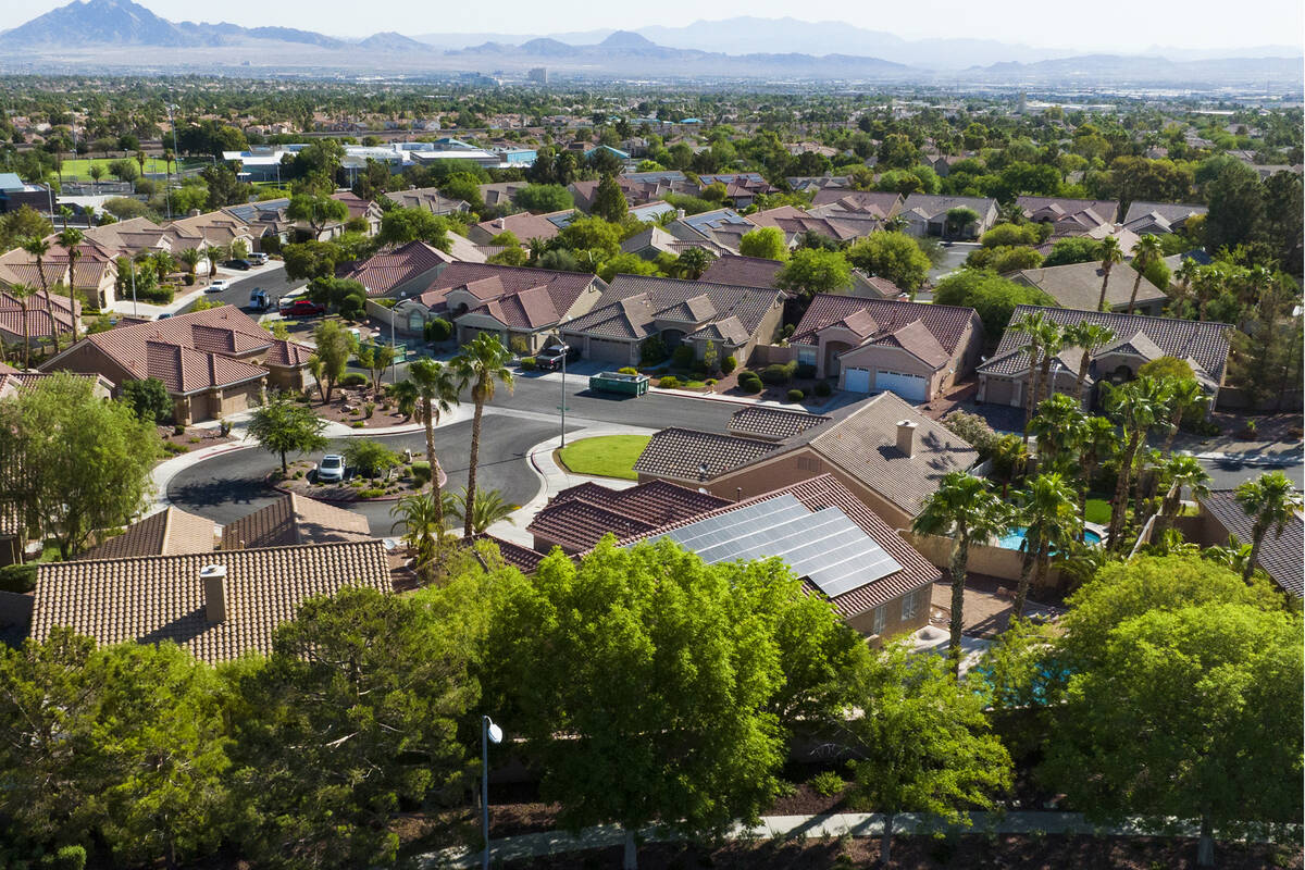 An aerial view shows homes surrounded by trees at Green Valley Parkway, on Thursday, July 20, 2 ...