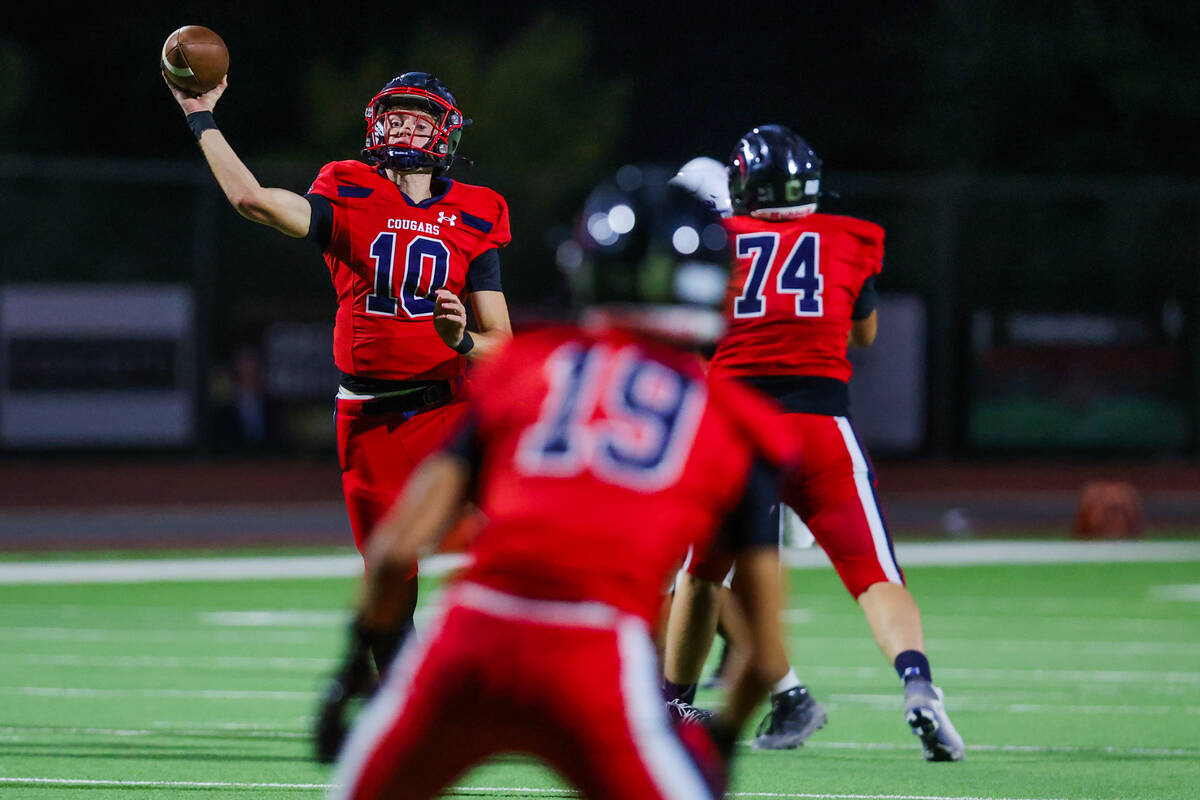 Coronado quarterback Aiden Krause (10) throws the ball to a teammate during a football game bet ...