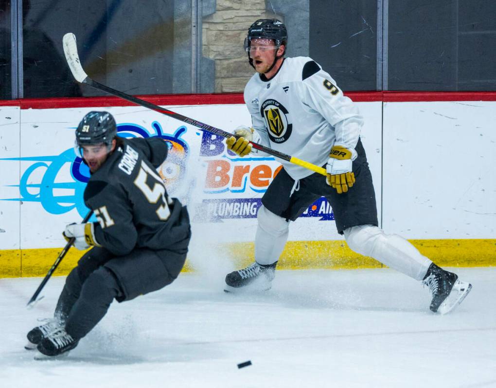 Golden Knights center Jack Eichel (9) looks to a pass getting past defenseman Lukas Cormier (51 ...