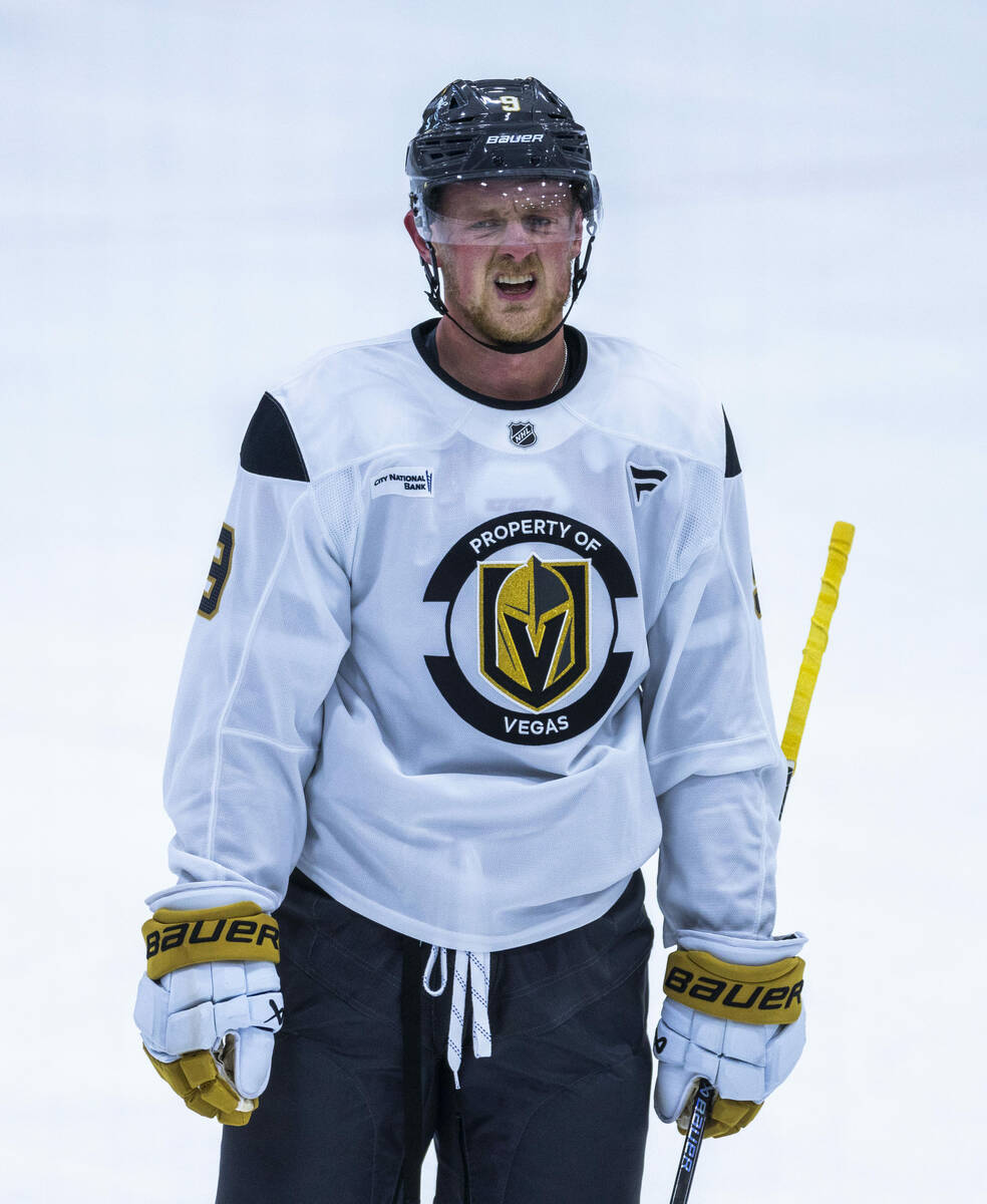 Golden Knights center Jack Eichel (9) is a bit tapped out after another drill during the first ...