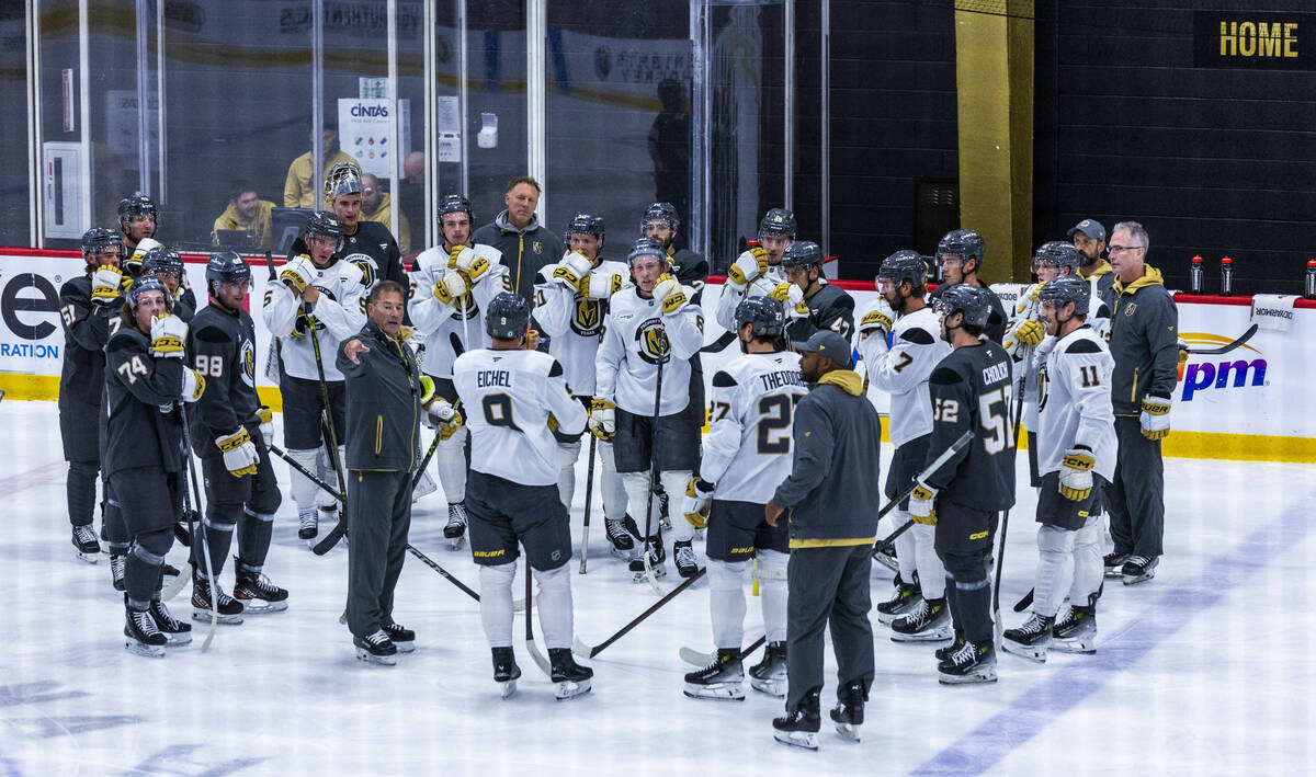 Golden Knights Head Coach Bruce Cassidy speaks to his players on the ice during the first day o ...