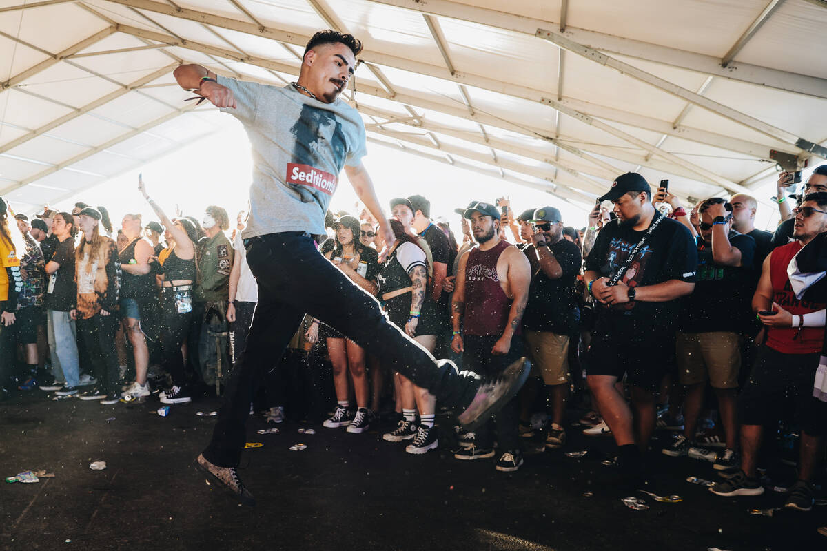 A festival attendee dances in a mosh pit during the Sick New World music festival at the Las Ve ...