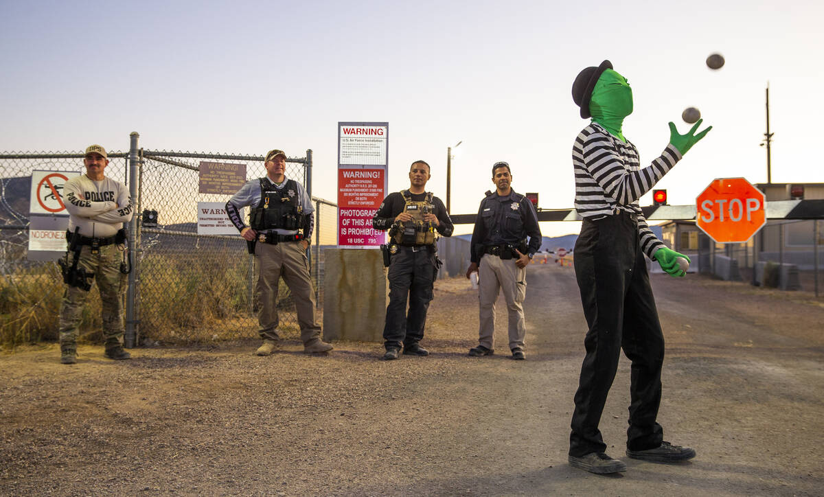 Scott Samford of Hollywood as an alien juggling mime entertains the security personnel at the b ...