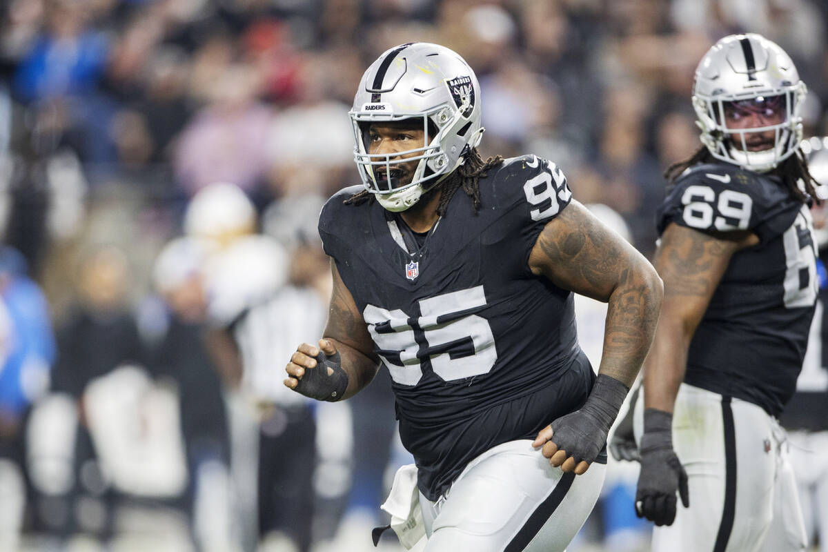 Raiders defensive tackle John Jenkins (95) comes off the field during the second half of an NFL ...