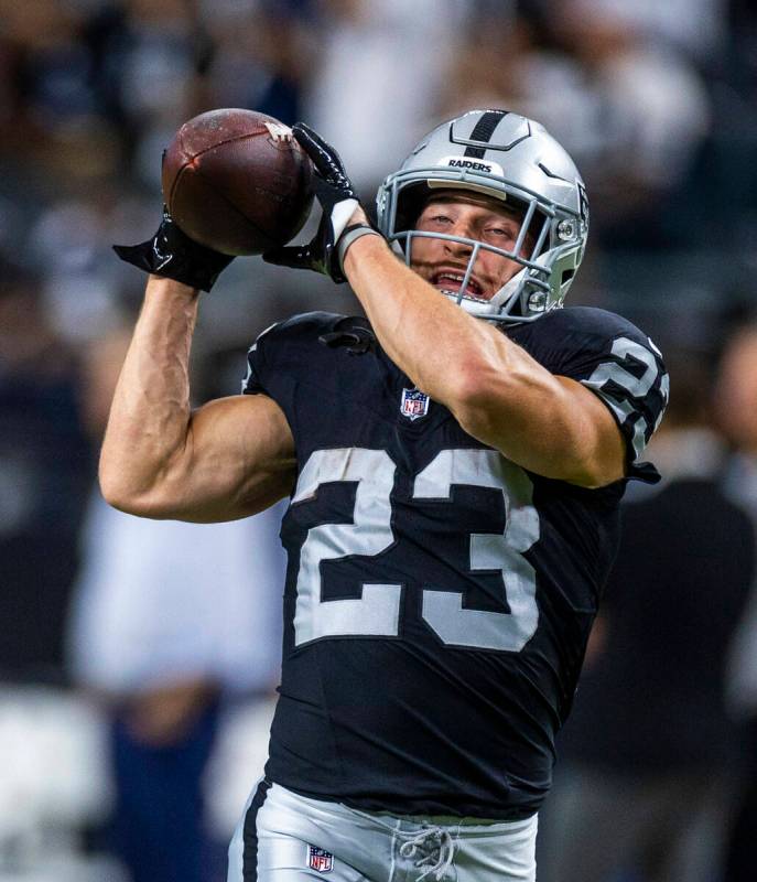 Raiders running back Dylan Laube (23) catches a pass as they face the Dallas Cowboys for their ...