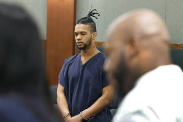 Gary Jackson, right, a brother of a murder victim Destiny Nicole Jackson, delivers his victim i ...