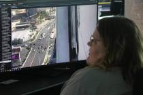 A Metropolitan Police Department staffer monitors West Flamingo Road that runs in front of the ...