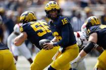 Michigan quarterback Davis Warren (16) plays during an NCAA football game on Saturday, Sept. 14 ...