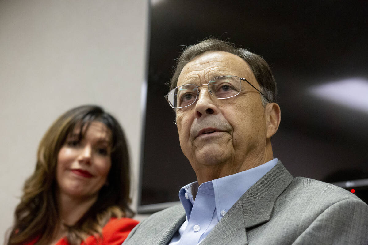 UNLV athletic director Desiree Reed-Francois, left, and former AD Jim Livengood, discuss the ef ...