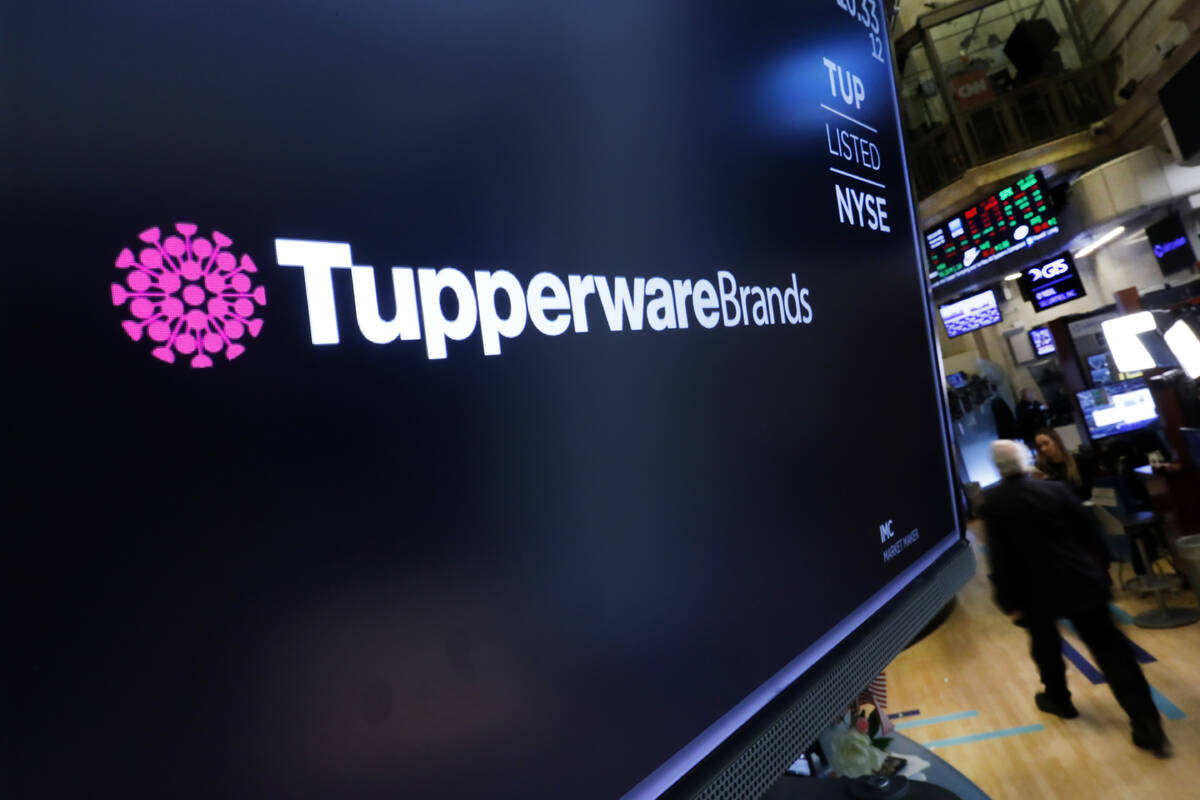 The logo for Tupperware Brands appears on a monitor on the floor of the New York Stock Exchange ...