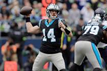 FILE - Carolina Panthers quarterback Andy Dalton (14) looks to pass against the Seattle Seahawk ...