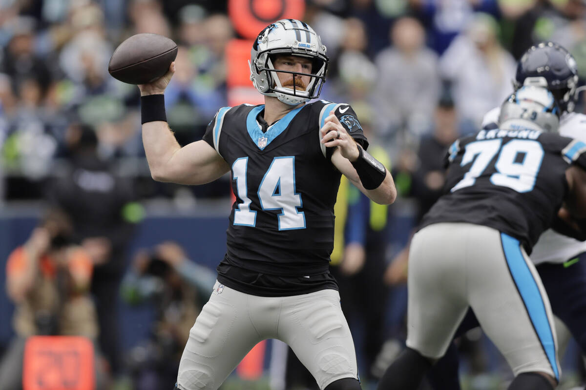 FILE - Carolina Panthers quarterback Andy Dalton (14) looks to pass against the Seattle Seahawk ...