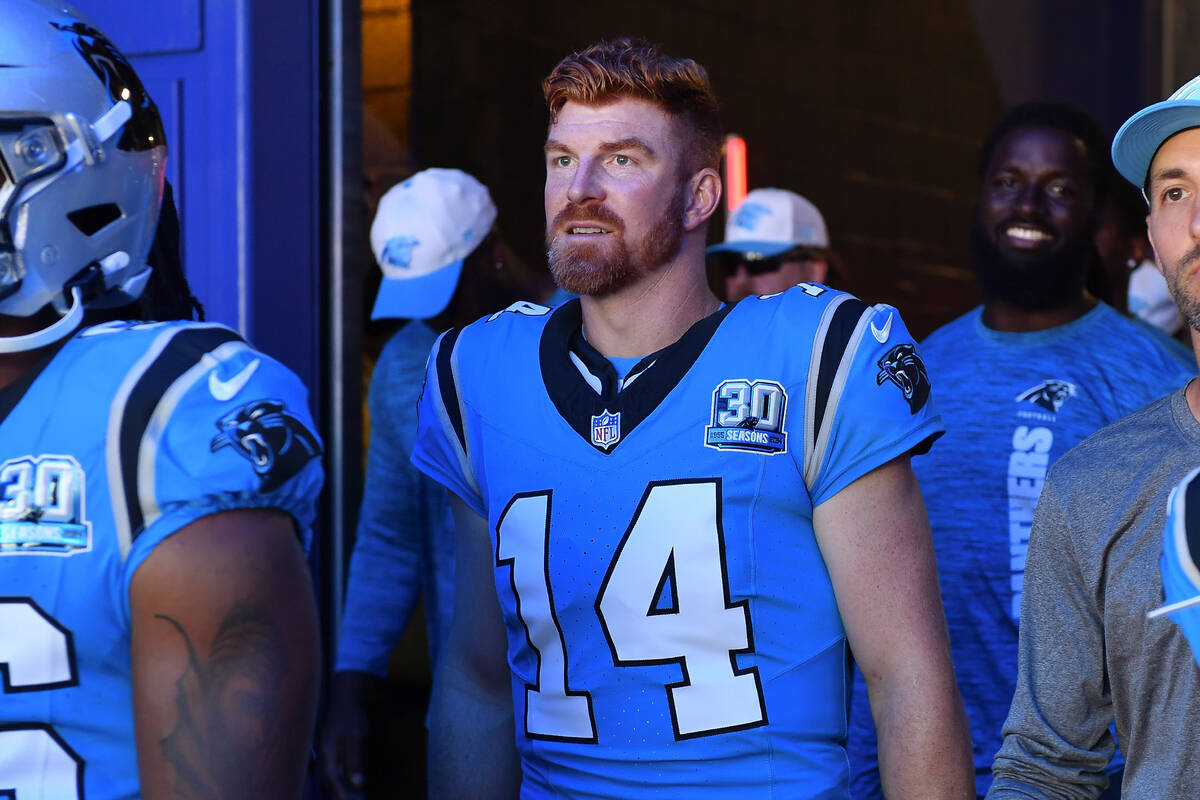 Carolina Panthers quarterback Andy Dalton (14) walks out of the tunnel before a preseason NFL f ...