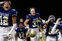 The Foothill bench reacts after Foothill wide receiver Jaymen Tiss, not pictured, jumps over a ...