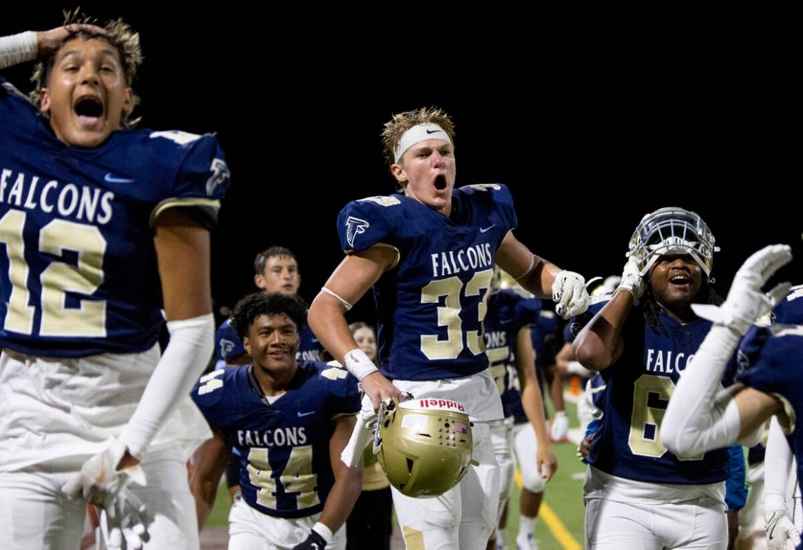 The Foothill bench reacts after Foothill wide receiver Jaymen Tiss, not pictured, jumps over a ...