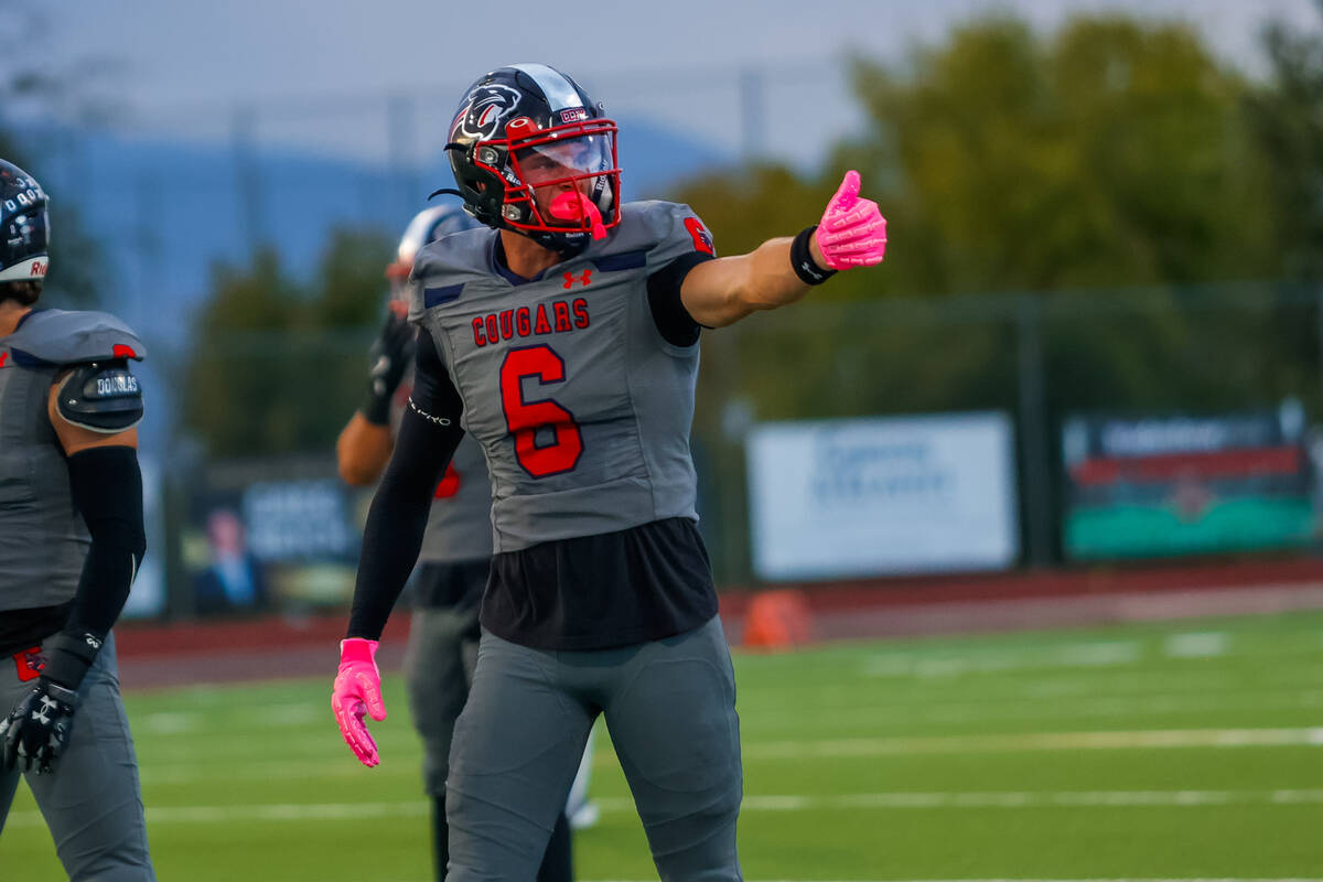 Coronado Wide Receiver JJ Buchanan (6) gives referee thumbs up while lining up during a footbal ...