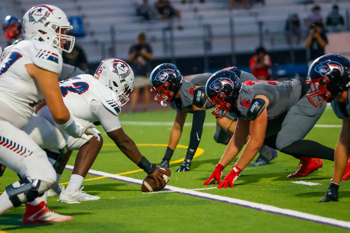 Coronado and Liberty players line up during a football game between Liberty and Coronado at Cor ...