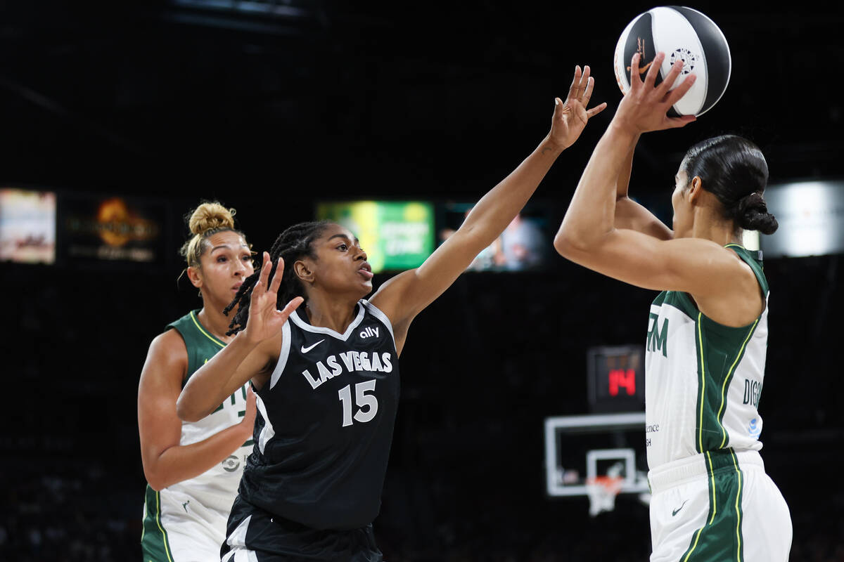 Las Vegas Aces guard Tiffany Hayes (15) defends against Seattle Storm guard Skylar Diggins-Smit ...