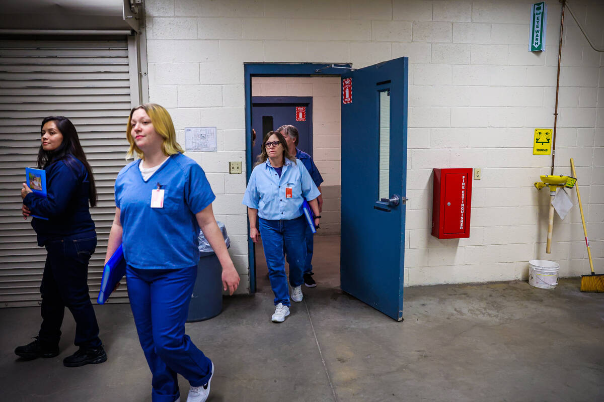 Students walk into a HVAC class for inmates at Florence McClure Women's Correctional Center on ...