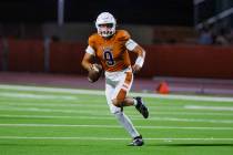 Legacy quarterback Aidan Crawford (9) rolls out of the pocket during a football game between Le ...