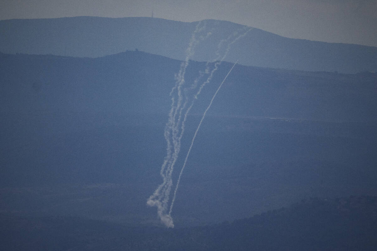 Israeli Iron Dome air defense system fires to intercept rockets that were launched from Lebanon ...