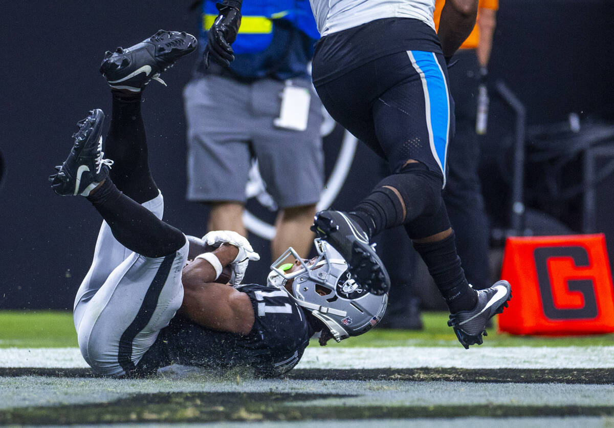 Raiders wide receiver Tre Tucker (11) catches a touchdown pass against the Carolina Panthers du ...