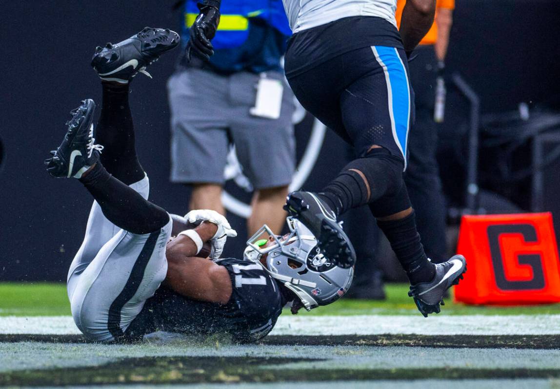 Raiders wide receiver Tre Tucker (11) catches a touchdown pass against the Carolina Panthers du ...