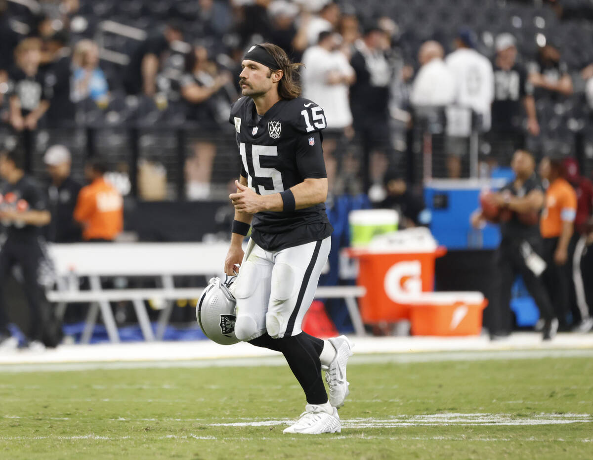 Raiders quarterback Gardner Minshew (15) leaves the field after losing 36-22 to Carolina Panthe ...